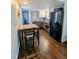 The dining area is adjacent to the kitchen with hardwood flooring at 529 Flanagan Rd, Henderson, NC 27537