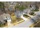 Aerial view of a residential neighborhood with well-maintained homes and landscaped yards at 604 Whistable Ave, Wake Forest, NC 27587