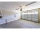 A spacious two car garage, with concrete floor, with open garage door at 604 Whistable Ave, Wake Forest, NC 27587