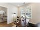 Bright office space featuring a large window, modern decor, and a comfortable work area at 604 Whistable Ave, Wake Forest, NC 27587