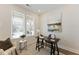 Bright office space featuring a large window, modern decor, and a comfortable work area at 604 Whistable Ave, Wake Forest, NC 27587