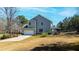 Two story home features an attached garage, nice yard and backyard patio at 627 Nixon Dr, Sanford, NC 27330