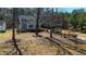 Inviting two-story home nestled on a lush lot with mature trees and beautiful landscape at 627 Nixon Dr, Sanford, NC 27330