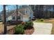 Charming two-story home featuring a convenient attached garage and beautifully landscaped yard at 627 Nixon Dr, Sanford, NC 27330