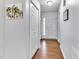 Bright foyer with wood floors and a front door with sidelights at 627 Nixon Dr, Sanford, NC 27330