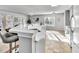 Bright, open kitchen featuring granite countertops and seating at the breakfast bar at 627 Nixon Dr, Sanford, NC 27330