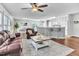 Inviting living room with open-concept layout to the kitchen and dining areas at 627 Nixon Dr, Sanford, NC 27330