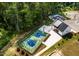 Aerial view of community basketball courts, pavilion, and surrounding greenery at 664 Sun Meadow Dr, Wake Forest, NC 27587