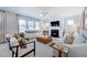 Comfortable living room featuring a ceiling fan, gas fireplace, and stylish furnishings at 664 Sun Meadow Dr, Wake Forest, NC 27587