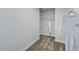Walk-in closet with carpet flooring and plenty of shelving for storage and hanging clothes at 664 Sun Meadow Dr, Wake Forest, NC 27587