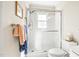 Cozy bathroom featuring glass enclosed shower and white ceramic toilet and sink at 712 Springwood Ave, Gibsonville, NC 27249