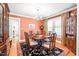 Traditional dining room with hardwood floors, decorative rug, and elegant chandelier at 712 Springwood Ave, Gibsonville, NC 27249