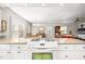 Open kitchen with view to the dining room and living area at 712 Springwood Ave, Gibsonville, NC 27249
