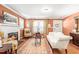 Cozy living room features a fireplace, hardwood floors, and elegant furniture at 712 Springwood Ave, Gibsonville, NC 27249
