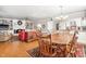 Open living space combining the kitchen, dining and living room areas at 712 Springwood Ave, Gibsonville, NC 27249