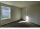 Bedroom featuring carpet flooring, and a window overlooking the outdoors at 72 Heatherglenn Cir, Princeton, NC 27569