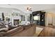 Comfortable living room with a fireplace, TV, and ample seating at 7604 Derek Dr, Raleigh, NC 27613