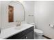 Bathroom featuring a single sink with a gold faucet at 7917 Blaney Franks Rd, Apex, NC 27539