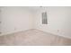 This bedroom provides a serene space with a large window letting in natural light at 7917 Blaney Franks Rd, Apex, NC 27539