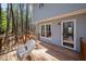 Back deck with chair and exterior door at 7917 Blaney Franks Rd, Apex, NC 27539
