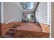 Brick patio and walkway between main home and garage at 7917 Blaney Franks Rd, Apex, NC 27539