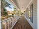 Relaxing porch with an extended view of the front yard, and plenty of natural lighting at 7917 Blaney Franks Rd, Apex, NC 27539