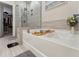 Bright bathroom with a luxurious tub and elegant decor at 803 Toulouse Ct, Cary, NC 27519