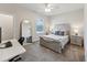 Comfortable bedroom with natural light, plush carpet, and stylish furniture at 803 Toulouse Ct, Cary, NC 27519