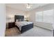 Inviting bedroom with neutral tones, plush carpet, and ambient lighting at 803 Toulouse Ct, Cary, NC 27519