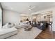 Open-concept living room connects to the kitchen and dining areas, promoting togetherness at 803 Toulouse Ct, Cary, NC 27519