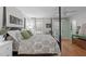 Bright bedroom with large windows, hardwood floors, and a comfortable, inviting atmosphere at 8504 Old Nc 86, Chapel Hill, NC 27516