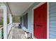 Relaxing front porch with swing offers a perfect spot to unwind at 8504 Old Nc 86, Chapel Hill, NC 27516