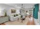 Bright and airy living room featuring hardwood floors, stylish decor, and comfortable furniture at 8504 Old Nc 86, Chapel Hill, NC 27516