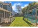 Beautiful backyard featuring a large playset and an outdoor grill, perfect for entertainment at 8704 Paddle Wheel Dr, Raleigh, NC 27615