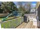 Outdoor patio featuring a grill, playset, perfect for summer barbecues and Gathering fun at 8704 Paddle Wheel Dr, Raleigh, NC 27615