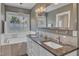 Elegant bathroom featuring a double vanity, large tub, granite countertop, and modern fixtures at 8704 Paddle Wheel Dr, Raleigh, NC 27615