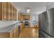 Spacious kitchen with stainless steel appliances and hardwood floors at 8704 Paddle Wheel Dr, Raleigh, NC 27615
