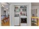 Convenient laundry room with washer, dryer, and shelving at 8704 Paddle Wheel Dr, Raleigh, NC 27615