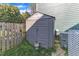 This home features a storage shed and AC unit at 8704 Paddle Wheel Dr, Raleigh, NC 27615