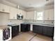 Modern kitchen featuring two-tone cabinets, new appliances, and lots of countertop space at 908 Colfax St, Durham, NC 27701