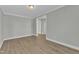 Living room featuring durable flooring, neutral wall paint, and overhead lighting at 9152 Dupree Meadow Dr # 12, Angier, NC 27501