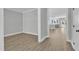 Open-concept living space with stylish wood-look floors, fresh paint and plenty of natural light at 9152 Dupree Meadow Dr # 12, Angier, NC 27501