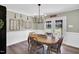 Elegant dining room featuring a stylish chandelier, modern decor, and an inviting space for Gathering gatherings at 99 Stoney Hill Ln, Sanford, NC 27332