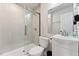 Bathroom featuring a glass shower, modern vanity, and updated features at 1001 Helms Pl, Raleigh, NC 27610