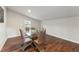 Modern dining room featuring a glass table with seating for six and contemporary decor at 1001 Helms Pl, Raleigh, NC 27610