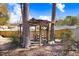 Backyard chicken coop with wire mesh surrounding a wooden frame, providing a secure and functional space at 104 Amberhill Ct, Garner, NC 27529