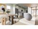 View of the dining area leading into the kitchen with stainless steel appliances at 1065 Hardin Hill Ln, Knightdale, NC 27545