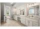 This spacious bathroom features double vanities, granite countertops, and access to the main bedroom at 119 November Dr, Durham, NC 27712