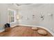Bright bonus room with hardwood floors, lots of natural light, and room for activities at 119 November Dr, Durham, NC 27712