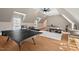 Game room with a ping pong table and a modern kitchenette at 119 November Dr, Durham, NC 27712